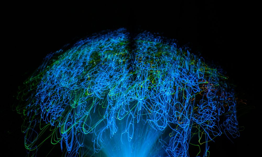 Artificial intelligence digital brain. Shaped with blue neural connection glowing lines.