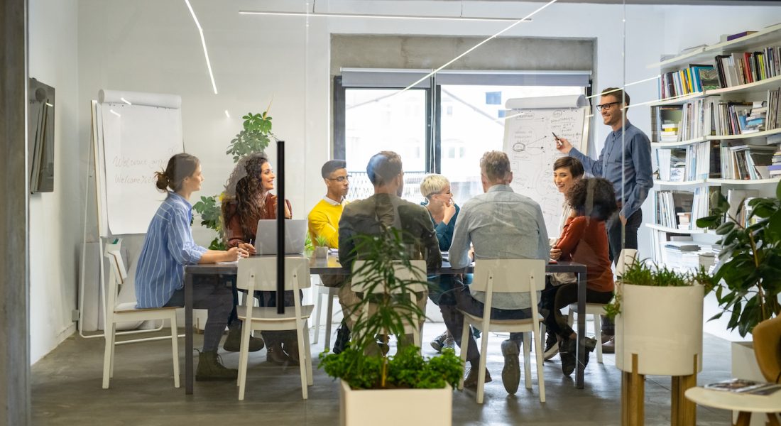 happy-casual-business-team-in-meeting.jpg